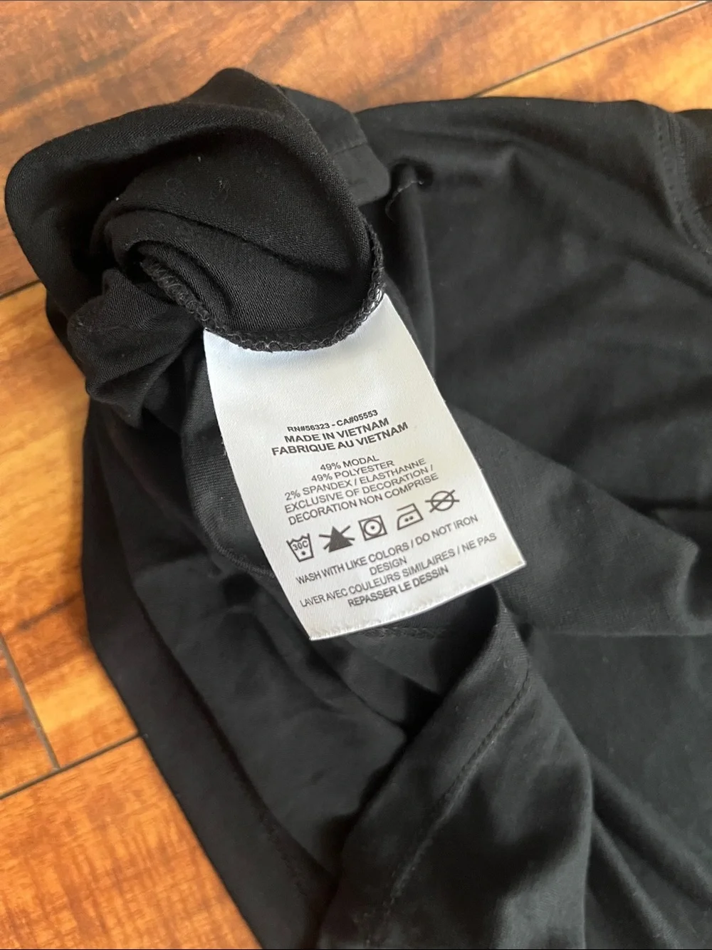 Nike Black Short-Sleeve Graphic Crop Tee with White Swoosh Accent